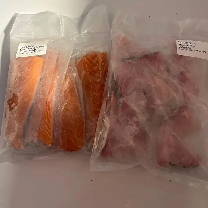 Salmon and fish fillets in sealed packs
